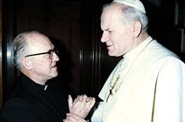 Fr. Aeden McGrath with Saint Pope John Paul II