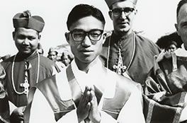 Fr. Paul Zingtung Grawng with Archbishop Gabriel Thohey and Bishop John Howe